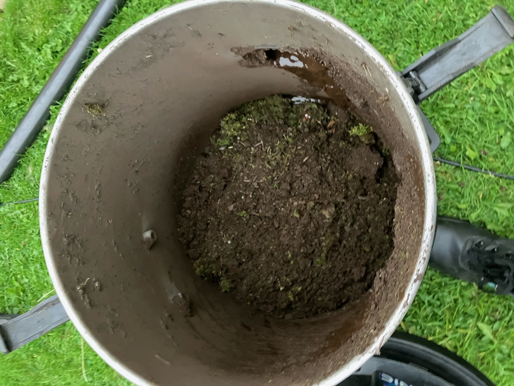 barrel full of gutter debris barrel full of gutter debris